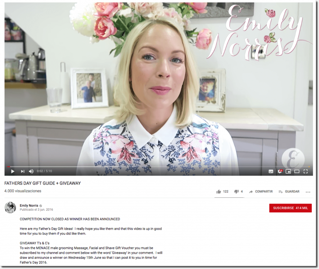 Father's Day promotion ideas on YouTube. The image shows a young woman in a room decorated with flowers and family photos. The video is titled "Father's Day gift guide + giveaway". The caption descrbies how to join a giveaway by commenting on the video.