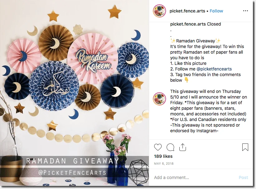 Screenshot of a Ramadan giveaway on Instagram. The image shows a collection of paper fans, moons and stars in blue, gold, and pink. Users can win the collection by liking, following, commenting, and tagging 2 friends.