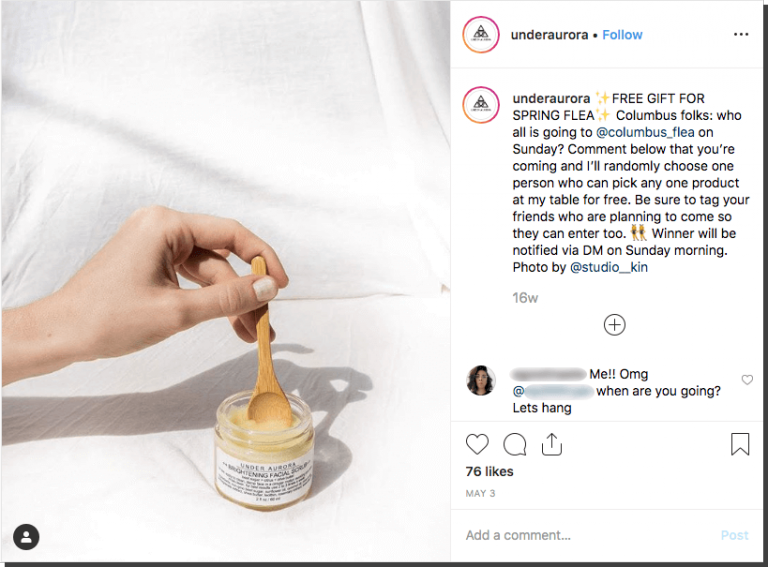 Spring giveaway ideas for Instagram. The image shows a hand stirring a beauty product. Users comment to win a free product of their choice from the brand's stall at the next town market.