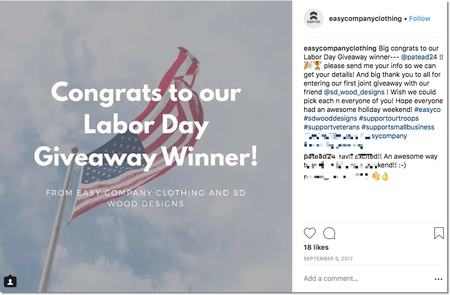 Instagram giveaways for Labor Day. The image shows a United States flag flying against a cloudy sky. The overlay text reads, "Congrats to our Labor Day giveaway winner! From Easy Company Clothing and SD Wood designs". The caption explains how the user can get in touch to claim their prize. The winner has commented on the post to say thank you.