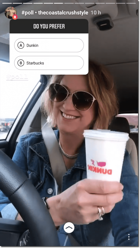 Screenshot of an Instagram Story running a poll. The image shows a smiling woman, wearing sunglasses and sitting in a car as she holds a takeaway coffee cup. The poll reads: "Do you prefer A, Dunkin or B, Starbucks?"