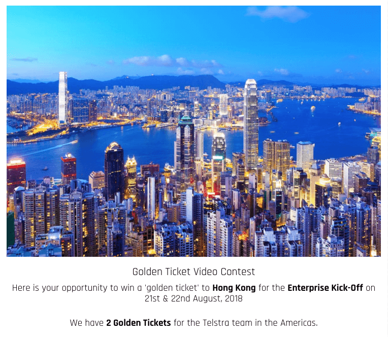 Front page of a video contest. The banner image shows Hong Kong city at night. The text below reads: "Golden Ticket Video Contest. Here is your opportunity to win a golden ticket to Hong Kong for the Enterprise Kick-off on 21st and 22nd August, 2018. We have 2 golden tickets for the Telstra team in the Americas."